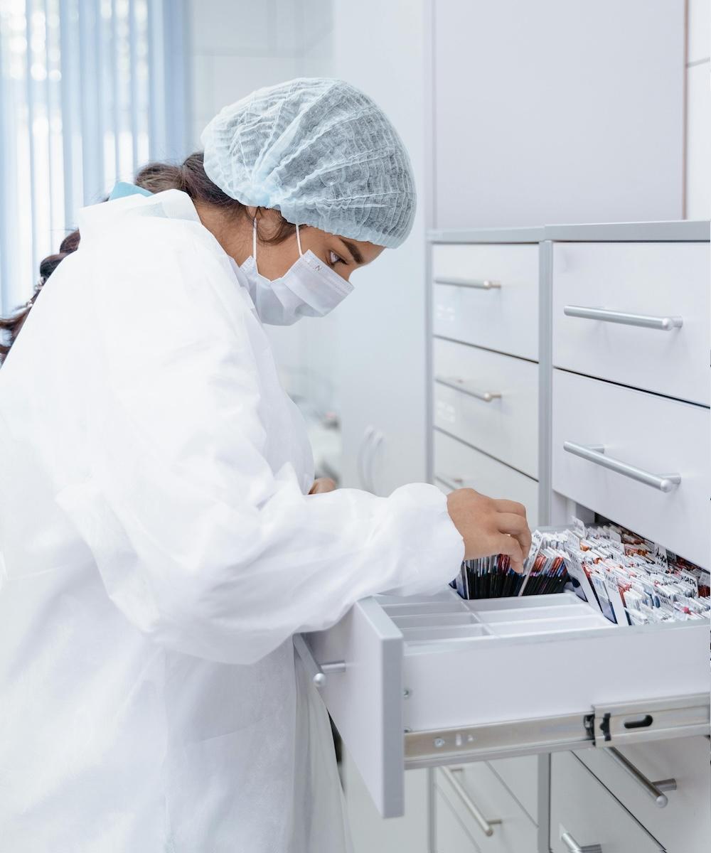 A healthcare professional organizing clinical records